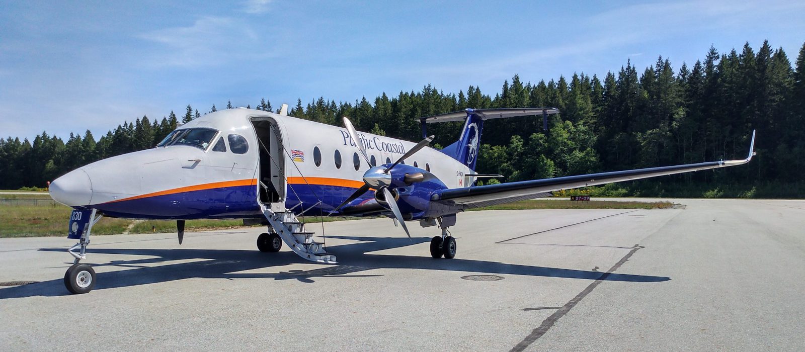 Prop aircraft parked on an airfield